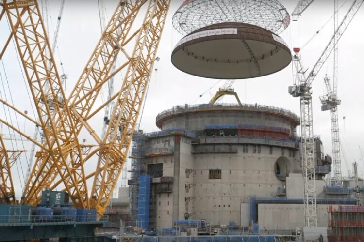 Big Carl lifts the 245-tonne dome onto Unit 2