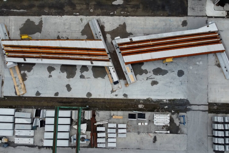 Drone shot of two-thirds of Greek Street rail bridge during assembly trials in Ireland