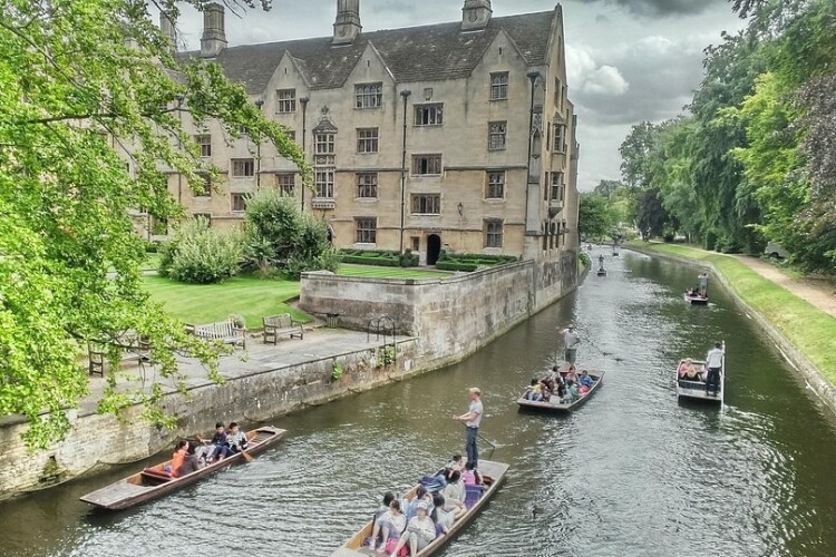 A visit to Cambridge is not required for taking the online course modules