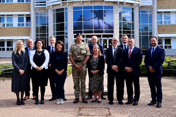 Representatives from the army, civil service and Bovis Construction gathered for the contract signing