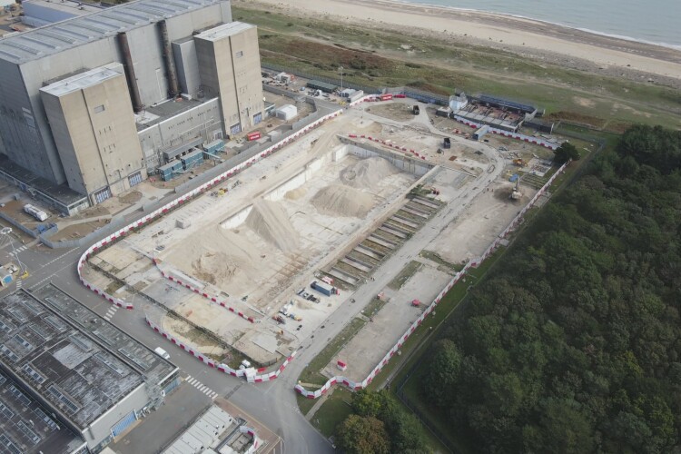  Drone shot of aggregate piles following the demolition of concrete plinths within Sizewell A's turbine hall [Photo from NRS]  	